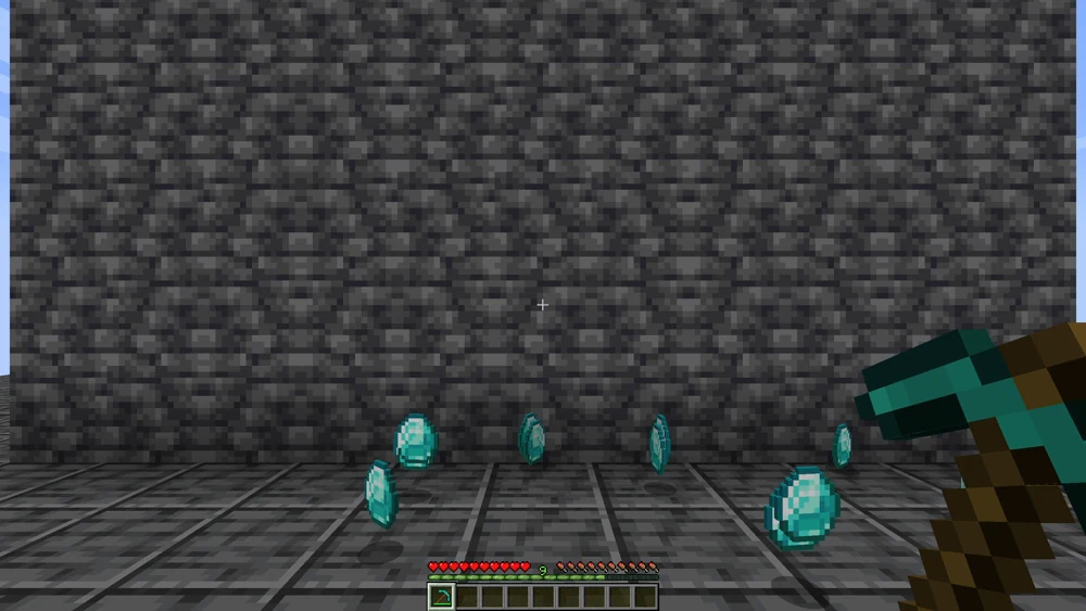 The diamonds lie collected in front of the player, the wall behind them is empty